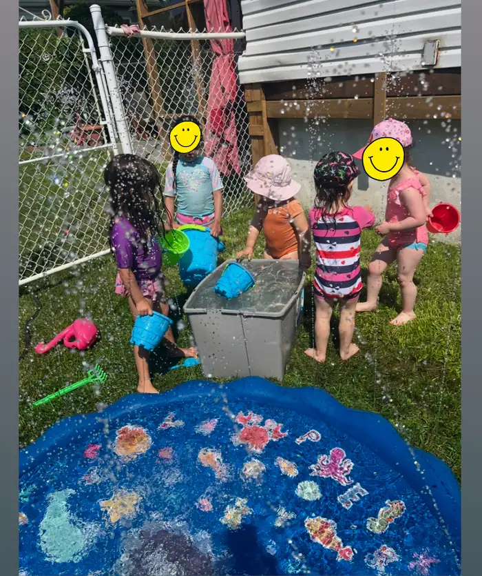Jeux d'eau en été — Garderie Tournesol
